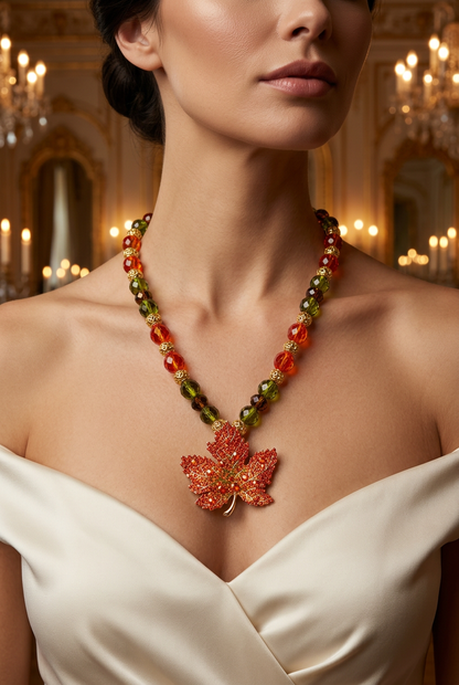 Autumn leaf necklace styled on a female model in a luxury candlelit setting