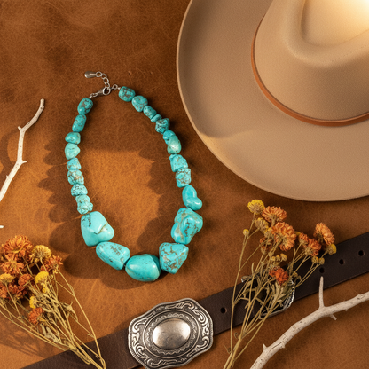 Turquoise Tides Statement Necklace western flat lay leather cowboy hat